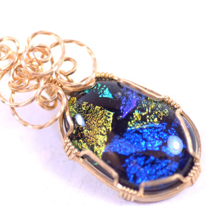 Black Stone with Blue, Purple, Yellow, Orange, and Teal Inlay, Rose Gold Tone Pendant